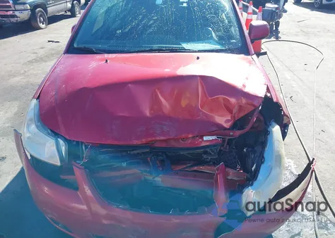 2013 Suzuki Sx4 Le/Le Popular z USA, uszkodzony, nr VIN JS2YC5A36D6100855